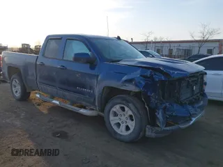 2017 Chevrolet Silverado 1500 LT with VIN 1GCVKREC7HZ349638, listed as a IAAI auction lot 41797563 with 136,915 mi miles. Bid and sale history available at carsss.com. Image 1.