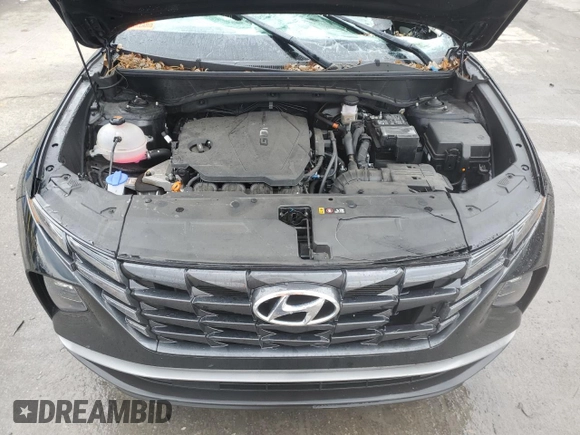 2023 Hyundai Tucson SEL with VIN 5NMJBCAE2PH270674, listed as a Copart auction lot 82879614 with 11,673 mi miles and Salvage Title. Bid and sale history available at DreamBid. Image 12.