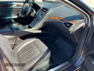 2013 Lincoln MKZ z VIN 3LN6L2GK3DR804377, wystawiony jako Copart lot #62822515 z przebiegiem 167 195 mil mil oraz Czysty tytuł • Clean title. Historia ofert i sprzedaży dostępna na DreamBid. Obrazek 5.