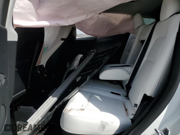 2024 Tesla Model Y Long Range with VIN 7SAYGDEE2RA335818, listed as a Copart auction lot 48821475 with 4,415 mi miles and Salvage Title. Bid and sale history available at DreamBid. Image 12.