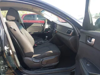 2017 Kia Optima LX with VIN 5XXGT4L33HG141559, listed as a IAAI auction lot 41863912 with 148,250 mi miles. Bid and sale history available at carsss.com. Image 5.