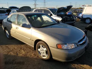 2001 Nissan Altima GXE with VIN 1N4DL01D71C106882, listed as a Copart auction lot 75677804 with 62,013 mi miles and Salvage Title. Bid and sale history available at carsss.com. Image 4.