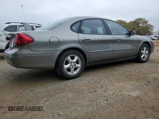 2003 Ford Taurus SES Standard with VIN 1FAFP552X3A178189, listed as a Copart auction lot 51162275 with 113,887 mi miles and Salvage Title. Bid and sale history available at carsss.com. Image 3.