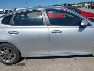 2019 Kia Optima LX with VIN 5XXGT4L3XKG294060, listed as a IAAI auction lot 42303397 with 127,081 mi miles and . Bid and sale history available at DreamBid. Image 13.