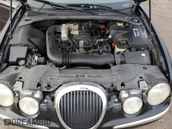 2000 Jaguar S-Type V8 z VIN SAJDA01D5YGL12576, wystawiony jako Copart lot #81679383 z przebiegiem 124 354 mil mil oraz Czysty tytuł • Clean title. Historia ofert i sprzedaży dostępna na DreamBid. Obrazek 11.