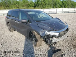 2021 Honda Odyssey Touring with VIN 5FNRL6H85MB012325, listed as a Copart auction lot 53367115 with Not provided miles and Salvage title. Bid and sale history available at DreamBid. Image 4.