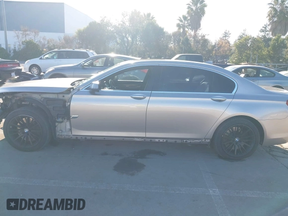 2015 BMW 7 Series 750Li with VIN WBAYE8C55FD782384, listed as a IAAI auction lot 41319363 with 75,784 mi miles. Bid and sale history available at carsss.com. Image 15.