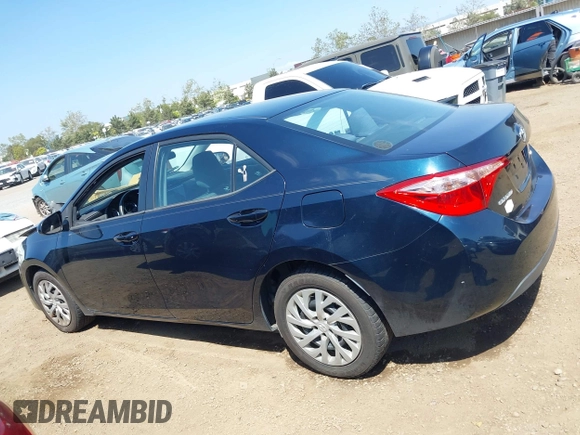 2019 Toyota Corolla L with VIN 2T1BURHE6KC185004, listed as a IAAI auction lot 42105629 with 111,907 mi miles. Bid and sale history available at carsss.com. Image 14.