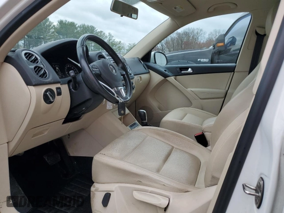 2012 Volkswagen Tiguan S with VIN WVGBV7AX5CW559037, listed as a Copart auction lot 51073435 with 56,620 mi miles and Salvage Title. Bid and sale history available at DreamBid. Image 7.