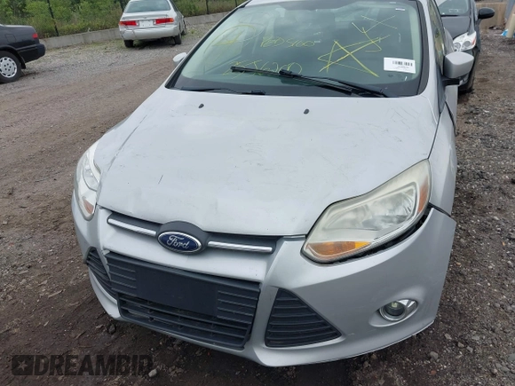 2012 Ford Focus SE with VIN 1FAHP3F29CL353872, listed as a IAAI auction lot 42528943 with Not provided miles and . Bid and sale history available at DreamBid. Image 12.