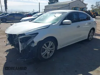 2013 Nissan Altima SV with VIN 1N4BL3APXDN551757, listed as a IAAI auction lot 41663814 with 102,547 mi miles and . Bid and sale history available at DreamBid. Image 2.