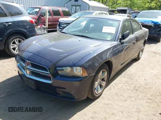 2012 Dodge Charger SE with VIN 2C3CDXBGXCH298176, listed as a IAAI auction lot 42138725 with 128,717 mi miles. Bid and sale history available at carsss.com. Image 2.