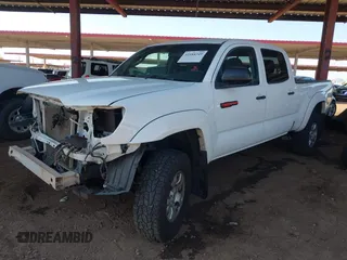 2015 Toyota Tacoma with VIN 3TMMU4FN0FM084956, listed as a IAAI auction lot 42184249 with 116,576 mi miles and . Bid and sale history available at DreamBid. Image 18.