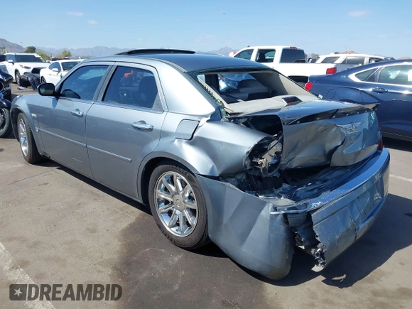2006 Chrysler 300 C with VIN 2C3KA63H56H313967, listed as a IAAI auction lot 42056998 with 143,592 mi miles and . Bid and sale history available at carsss.com. Image 3.