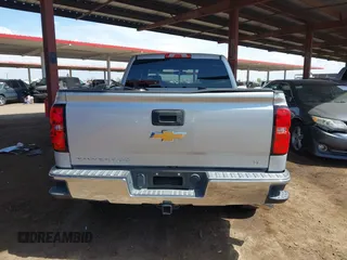 2016 Chevrolet Silverado 1500 LT with VIN 1GCRCREC3GZ185219, listed as a IAAI auction lot 41970474 with 124,101 mi miles and . Bid and sale history available at DreamBid. Image 17.