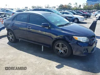 2012 Toyota Corolla L with VIN 2T1BU4EE3CC779137, listed as a IAAI auction lot 42008243 with 123,760 mi miles. Bid and sale history available at carsss.com. Image 1.
