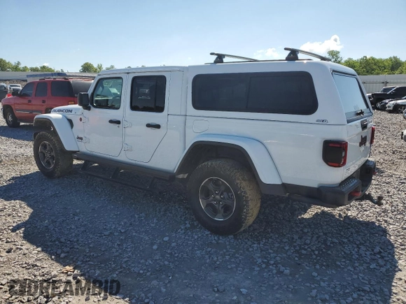 2023 Jeep Gladiator Rubicon with VIN 1C6JJTBG9PL546437, listed as a Copart auction lot 55516685 with 14,106 mi miles and Salvage title. Bid and sale history available at DreamBid. Image 2.