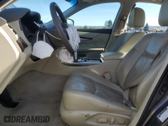2012 Infiniti M37 with VIN JN1BY1AP8CM333839, listed as a Copart auction lot 84052134 with 121,979 mi miles and Salvage Title. Bid and sale history available at carsss.com. Image 7.