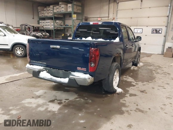 2011 GMC Canyon SLE1 with VIN 1GTH6MFE3B8123808, listed as a IAAI auction lot 41611231 with 142,877 mi miles. Bid and sale history available at carsss.com. Image 4.