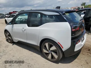 2018 BMW i3 with VIN WBY7Z4C54JVD96989, listed as a Copart auction lot 52804063 with 50,865 mi miles. Bid and sale history available at carsss.com. Image 2.