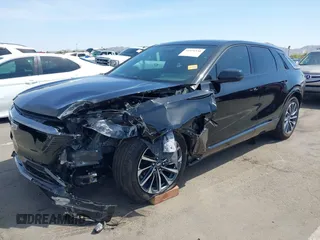 2024 Cadillac LYRIQ Sport z VIN 1GYKPVRK6RZ131099, wystawiony jako IAAI lot #41979330 z przebiegiem 3953 mil mil oraz . Historia ofert i sprzedaży dostępna na DreamBid. Obrazek 2.