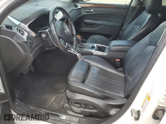 2016 Cadillac SRX Luxury Collection with VIN 3GYFNBE39GS526005, listed as a Copart auction lot 61870615 with 188,017 mi miles and Salvage title. Bid and sale history available at DreamBid. Image 7.