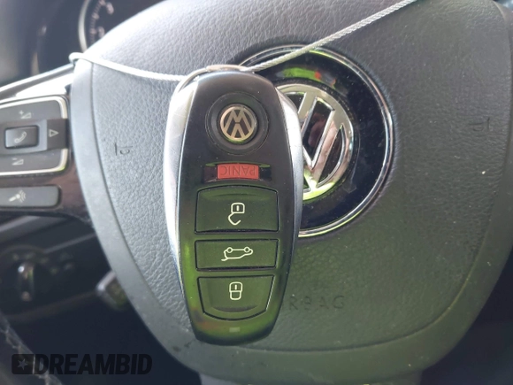 2016 Volkswagen Touareg Sport with VIN WVGEF9BP0GD012148, listed as a IAAI auction lot 42195030 with 95,984 mi miles and . Bid and sale history available at DreamBid. Image 11.