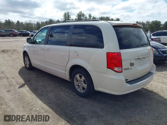 2012 Dodge Grand Caravan SXT with VIN 2C4RDGCGXCR248859, listed as a IAAI auction lot 41829411 with 111,515 mi miles and . Bid and sale history available at DreamBid. Image 3.