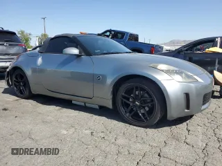 2004 Nissan 350Z Enthusiast z VIN JN1AZ36D34T110490, wystawiony jako Copart lot #57863915 z przebiegiem 139 757 mil mil oraz Szkody całkowita. Historia ofert i sprzedaży dostępna na DreamBid. Obrazek 4.