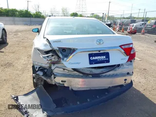 2015 Toyota Camry XLE with VIN 4T1BF1FK1FU977554, listed as a IAAI auction lot 42083589 with 104,811 mi miles and . Bid and sale history available at DreamBid. Image 6.