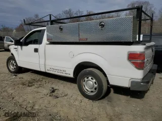 2014 Ford F-150 XL with VIN 1FTMF1CM7EKE77640, listed as a Copart auction lot 49210625 with 182,785 mi miles and Salvage Title. Bid and sale history available at carsss.com. Image 2.