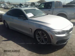2015 BMW 4 Series 428i z VIN WBA3N7C50FK223504, wystawiony jako IAAI lot #39593317 z przebiegiem 64 668 mil mil oraz . Historia ofert i sprzedaży dostępna na DreamBid. Obrazek 1.