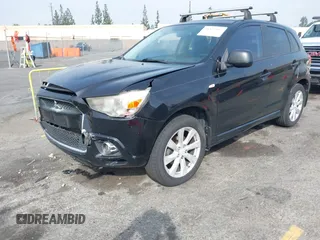 2012 Mitsubishi Outlander Sport SE with VIN JA4AP4AU6CZ000667, listed as a IAAI auction lot 41473935 with 195,414 mi miles. Bid and sale history available at carsss.com. Image 2.