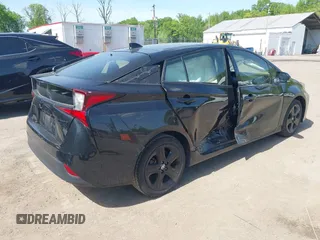 2022 Toyota Prius L Eco with VIN JTDKAMFU0N3175619, listed as a IAAI auction lot 42098135 with 72,984 mi miles and . Bid and sale history available at DreamBid. Image 4.