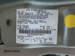 2006 Ford Focus S z VIN 1FAFP34N46W158513, wystawiony jako Copart lot #45229755 z przebiegiem 149 811 mil mil oraz Szkoda całkowita • Salvage title. Historia ofert i sprzedaży dostępna na DreamBid. Obrazek 12.