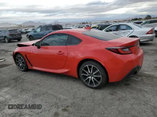 2023 Toyota GR86 with VIN JF1ZNBC14P8756375, listed as a Copart auction lot 82385244 with 56,912 mi miles and Salvage Title. Bid and sale history available at carsss.com. Image 2.