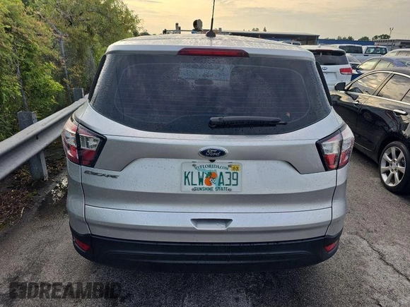 2018 Ford Escape S with VIN 1FMCU0F72JUB68024, listed as a IAAI auction lot 42849105 with 96,473 mi miles and . Bid and sale history available at DreamBid. Image 6.
