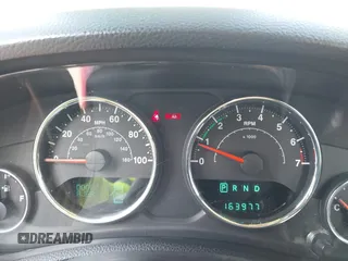 2013 Jeep Wrangler Sport z VIN 1C4GJWAG0DL543850, wystawiony jako IAAI lot #42374916 z przebiegiem 163 977 mil mil oraz . Historia ofert i sprzedaży dostępna na DreamBid. Obrazek 7.