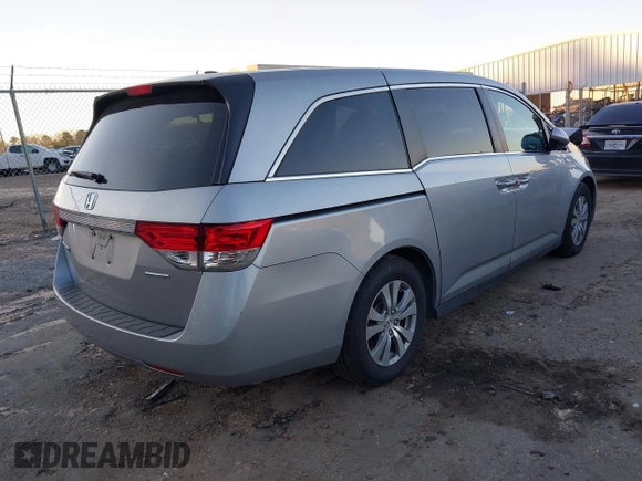 2017 Honda Odyssey SE with VIN 5FNRL5H38HB020908, listed as a IAAI auction lot 41239727 with 112,316 mi miles and . Bid and sale history available at carsss.com. Image 4.
