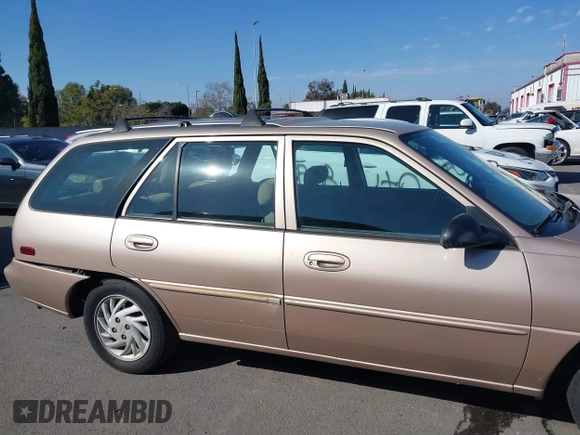 1999 Ford Escort SE with VIN 3FAFP15P6XR102047, listed as a IAAI auction lot 41686181 with 61,350 mi miles. Bid and sale history available at carsss.com. Image 14.