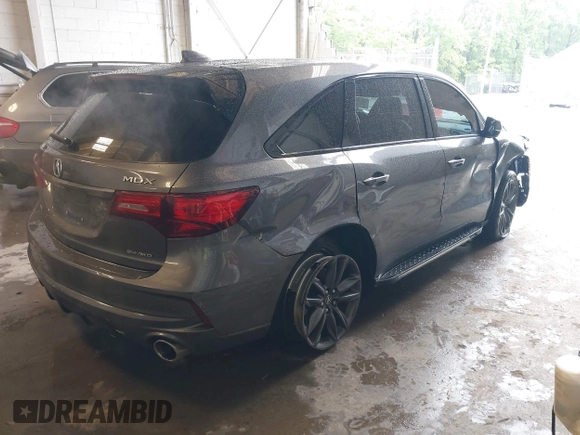 2019 Acura MDX Technology with VIN 5J8YD4H0XKL025557, listed as a IAAI auction lot 42365567 with 102,733 mi miles and . Bid and sale history available at DreamBid. Image 4.