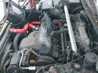 1991 Honda Accord EX z VIN JHMCB7560MC063583, wystawiony jako IAAI lot #42563870 z przebiegiem 226 798 mil mil oraz . Historia ofert i sprzedaży dostępna na DreamBid. Obrazek 21.