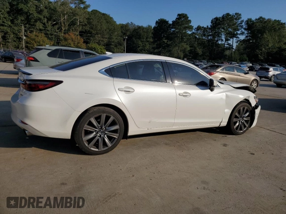2019 Mazda 6 Grand Touring with VIN JM1GL1TY4K1507123, listed as a Copart auction lot 74100054 with 63,809 mi miles and Salvage Title. Bid and sale history available at carsss.com. Image 3.