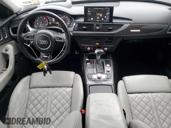 2014 Audi S6 Prestige z VIN WAUF2AFC2EN091453, wystawiony jako Copart lot #43369445 z przebiegiem 111 502 mil mil oraz Szkody całkowita. Historia ofert i sprzedaży dostępna na DreamBid. Obrazek 8.