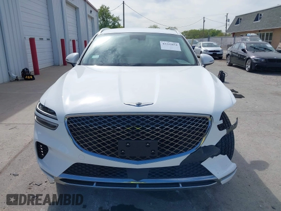 2022 Genesis GV70 2.5T with VIN KMUMADTB0NU043317, listed as a IAAI auction lot 42222034 with 30,566 mi miles and . Bid and sale history available at DreamBid. Image 13.