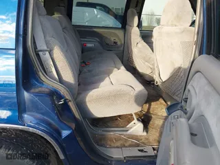 1998 Chevrolet Tahoe with VIN 1GNEK13RXWJ372276, listed as a IAAI auction lot 41458359 with 229,582 mi miles. Bid and sale history available at carsss.com. Image 8.