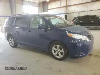 2014 Toyota Sienna LE AAS with VIN 5TDKK3DC7ES451097, listed as a Copart auction lot 55211105 with 251,705 mi miles and Salvage Title. Bid and sale history available at DreamBid. Image 4.