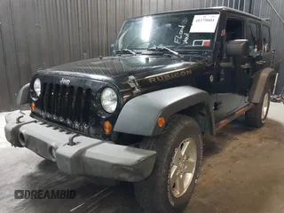 2009 Jeep Wrangler Unlimited Rubicon z VIN 1J8GA69109L738914, wystawiony jako IAAI lot #40379001 z przebiegiem 120 153 mil mil oraz . Historia ofert i sprzedaży dostępna na DreamBid. Obrazek 2.