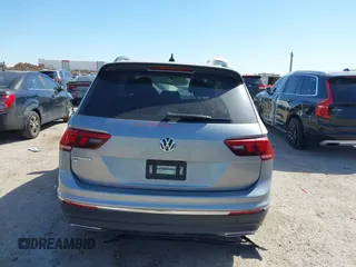 2021 Volkswagen Tiguan SE with VIN 3VV3B7AXXMM116774, listed as a IAAI auction lot 41868796 with Not Provided miles and . Bid and sale history available at DreamBid. Image 15.