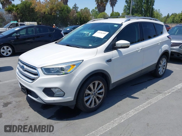 2018 Ford Escape Titanium with VIN 1FMCU0J94JUB26110, listed as a IAAI auction lot 42436285 with 59,586 mi miles and . Bid and sale history available at DreamBid. Image 18.